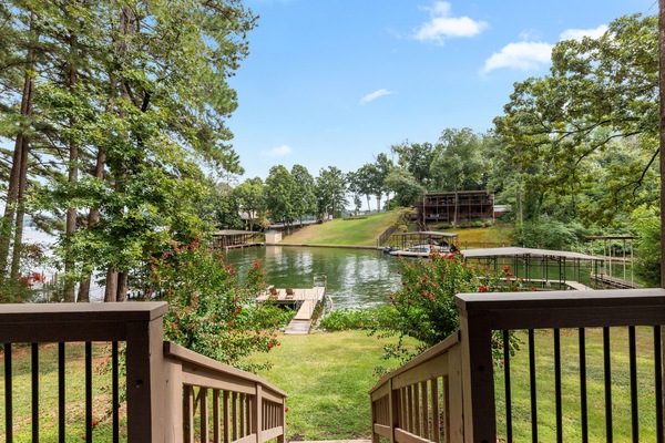 Lower balcony provides direct access to lake.