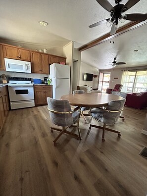 Fridge, microwave, oven, stovetop - 3 Bedroom 2 Bath Cabin nestled in the woods minutes from Mark Twain Lake. (Stoutsville)