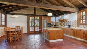 Enjoy cooking in this well-equipped kitchen with a large island and modern appliances.