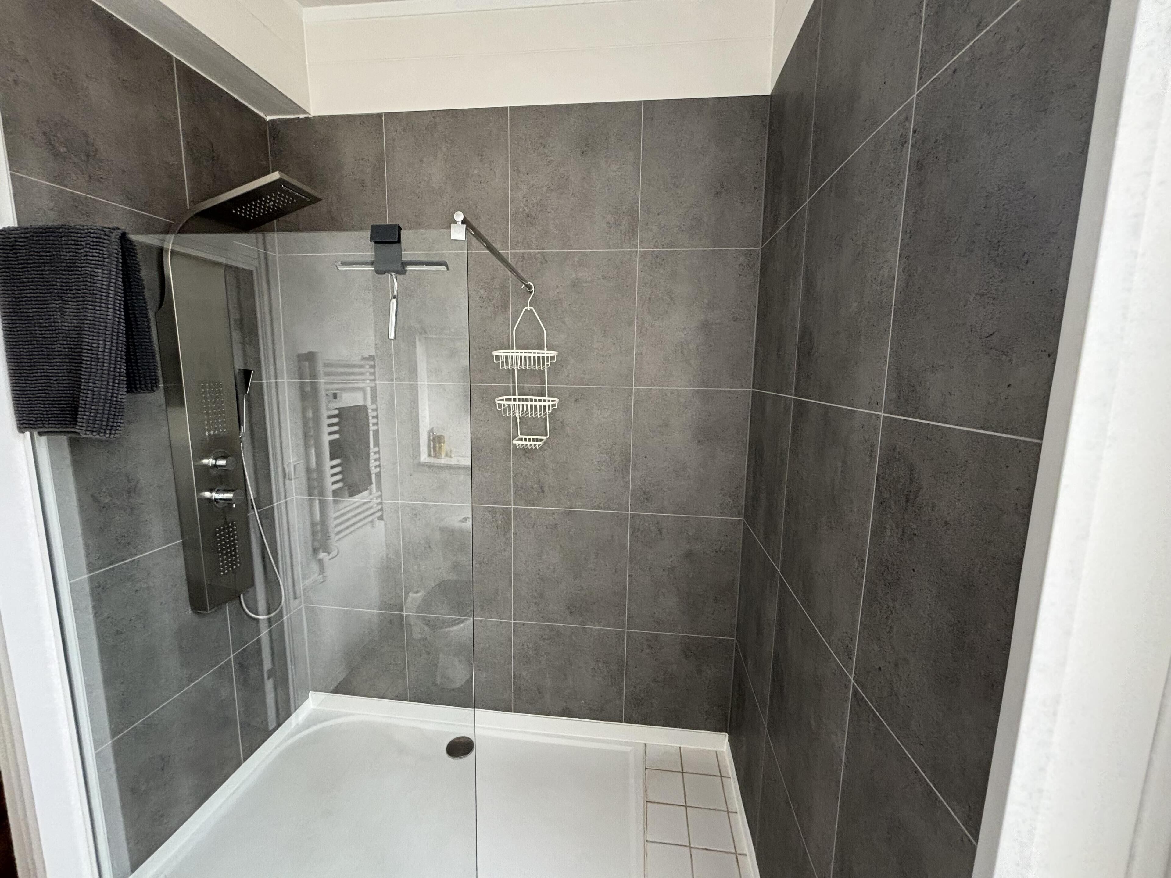 Shower, free toiletries, hair dryer, towels