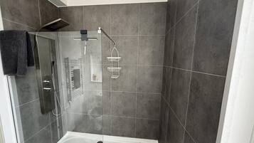 Shower, free toiletries, hair dryer, towels