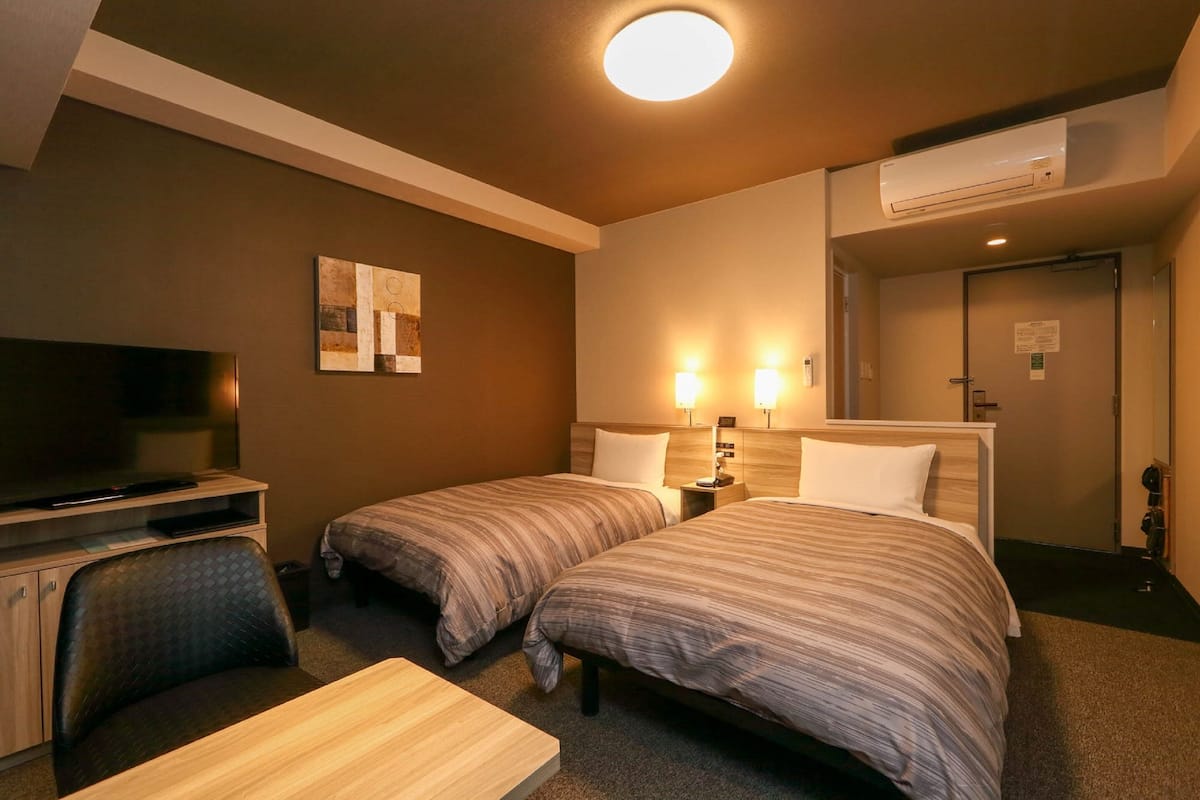 Kamar Twin Superior, Bebas Asap Rokok | Meja kerja, Wi-Fi gratis, dan seprai linen