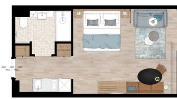 Plano de un cuarto de hotel con cama, escritorio, silla, mesita, sofá y baño.