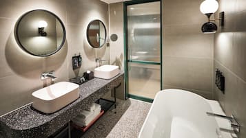 Suite, 1 King Bed (Rock Star) | Bathroom | Eco-friendly toiletries, hair dryer, bathrobes, slippers