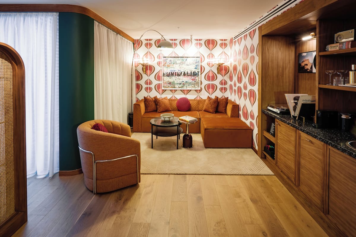 Suite, 1 King Bed (Rock Star) | Pillowtop beds, in-room safe, blackout drapes, soundproofing