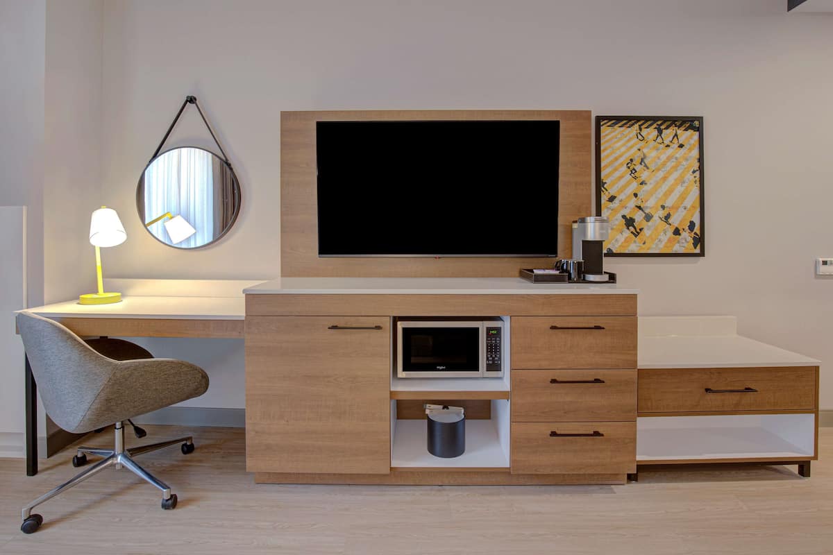 premium bedding, down duvets, memory-foam beds, in-room safe