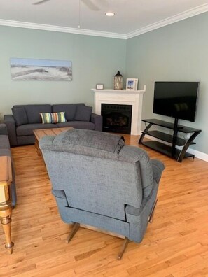 TV, fireplace, books - Very unique, there are two townhouses that share a pool area (Wildwood Crest)