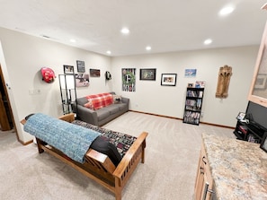 Living area - Rustic Charm: Pewaukee Lake Cabin, Sauna & Hot Tub (Pewaukee)