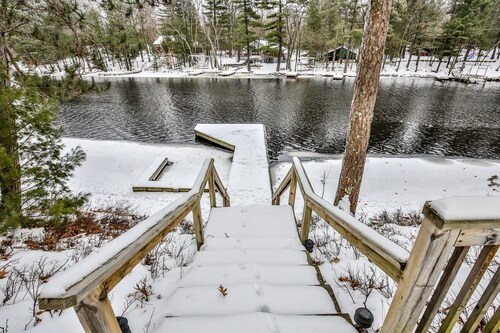 Stunning Lakefront home with enclosed porch, dock, and firepit!