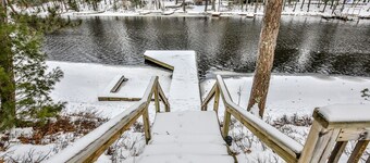 Stunning Lakefront home with enclosed porch, dock, and firepit!