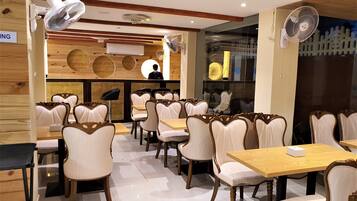 Breakfast, lunch, dinner served; vegetarian cuisine, pool views