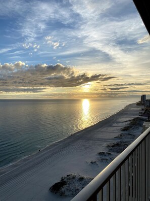On the beach, sun-loungers