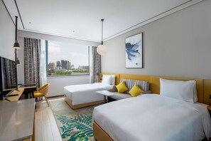 Premium bedding, down duvets, in-room safe, desk