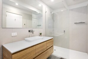 Bathtub, hair dryer, towels