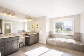 Combined shower/bathtub, towels, soap, shampoo