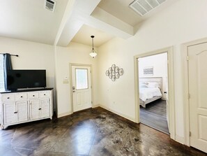 2 bedrooms, desk, iron/ironing board, travel crib