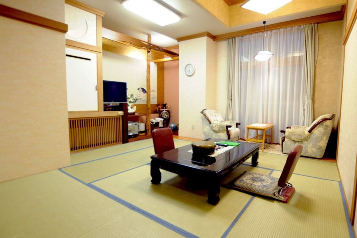 Japanese Style Room With Rock Bath For Three Guests
