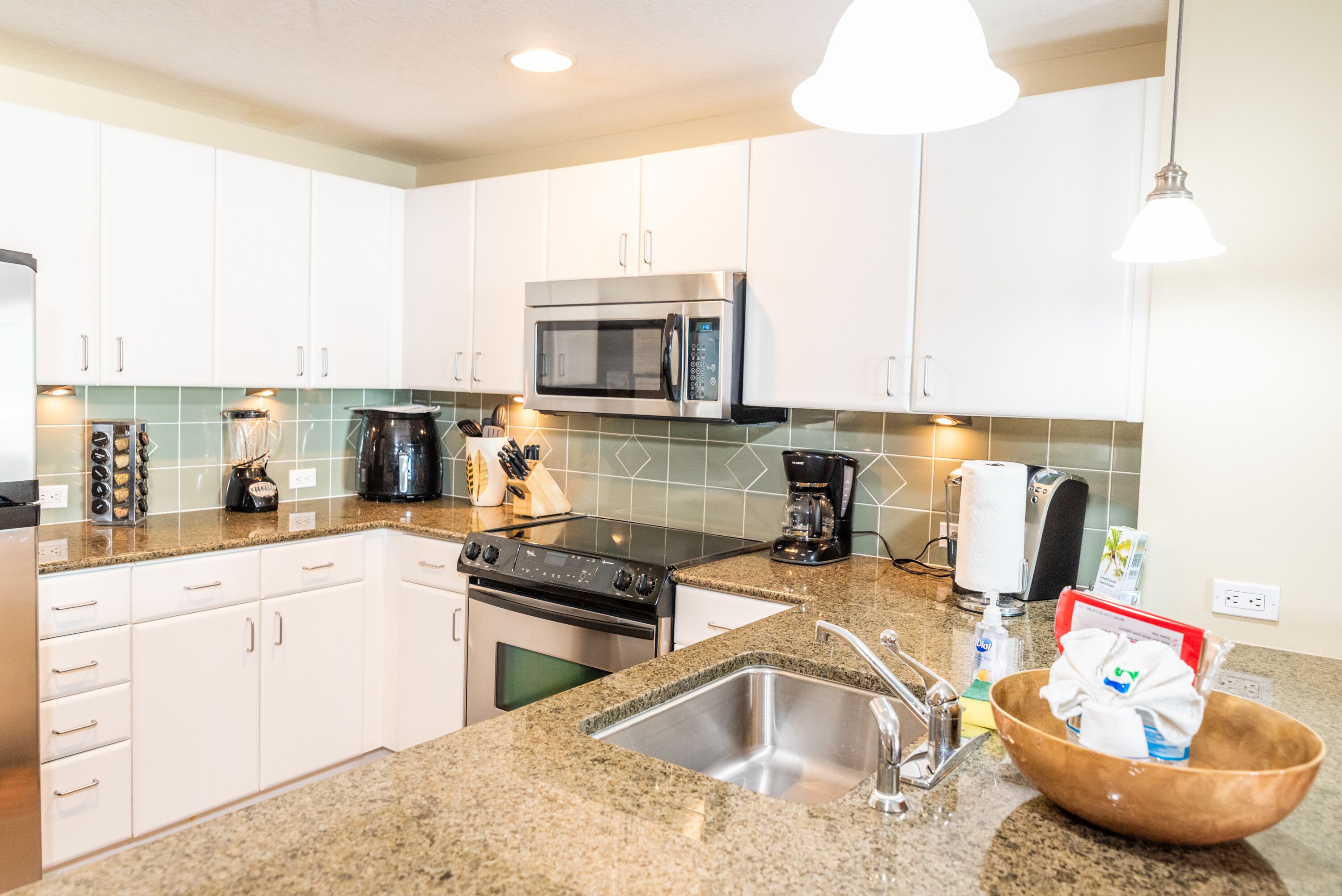 stainless appliances and granite countertops.