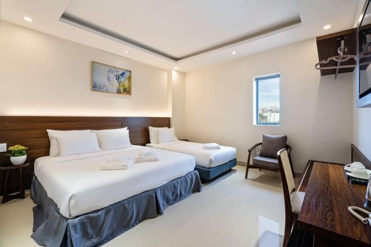Premium bedding, Select Comfort beds, free minibar items, desk