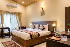 Deluxe Double Room | Living area | 32-inch LCD TV with digital channels, TV, streaming services - Hotel Walnut Creek (Nainital)