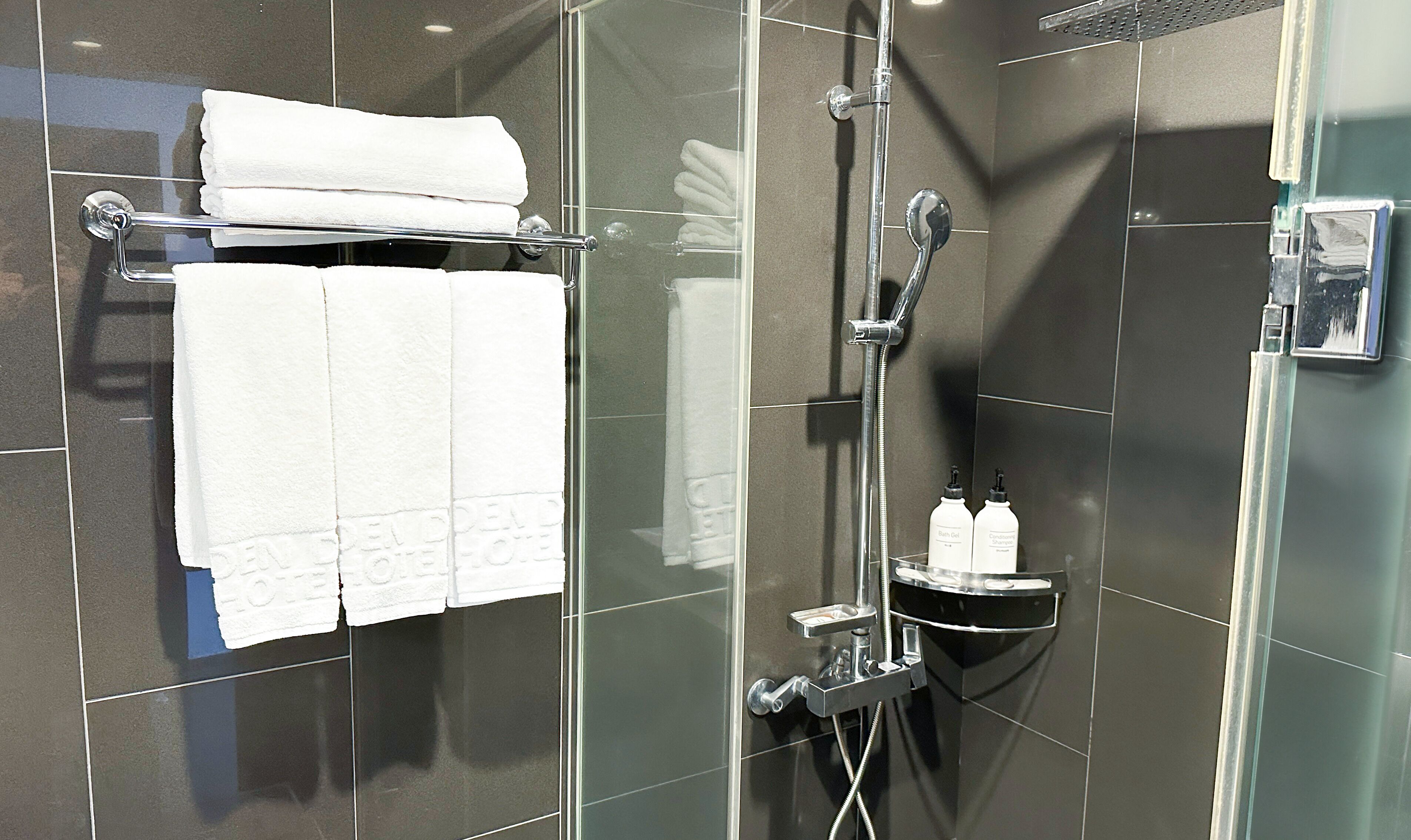 family room, multiple beds, non smoking | bathroom | shower, hair dryer, slippers, towels