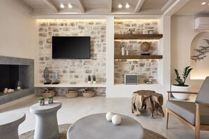 Smart-TV, Kamin, Bücher, Musikbibliothek