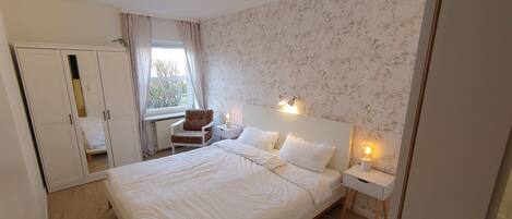 1 Schlafzimmer, Reisekinderbett, kostenloses WLAN, Bettwäsche