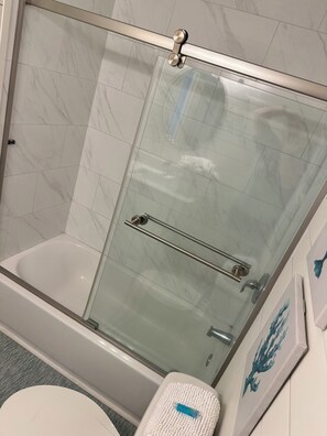 Combined shower/bathtub, hair dryer, towels, soap - Sugar Suite at Phoenix IV (Orange Beach)