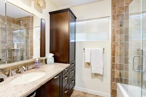 Bathtub, hair dryer, towels