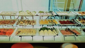 A buffet with various dishes arranged on trays. - Marmara Deluxe Hotel (Istanbul)
