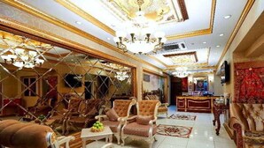 A luxurious lobby with ornate chandeliers, plush seating, and a polished floor. - Marmara Deluxe Hotel (Istanbul)
