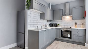Apartment | Private kitchen | Full-size fridge, microwave, oven, stovetop