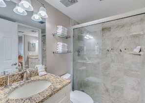 Hair dryer, towels, soap, shampoo