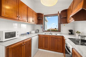 Fridge, microwave, oven, dishwasher