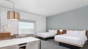 Desk, laptop workspace, blackout drapes, iron/ironing board