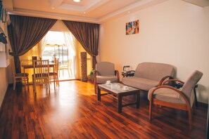 40-inch flat-screen TV with cable channels, TV