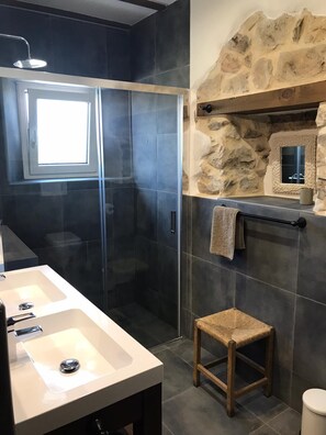 Shower, hair dryer, towels, toilet paper