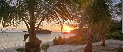 On the beach, sun loungers