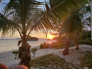 On the beach, sun loungers, beach towels