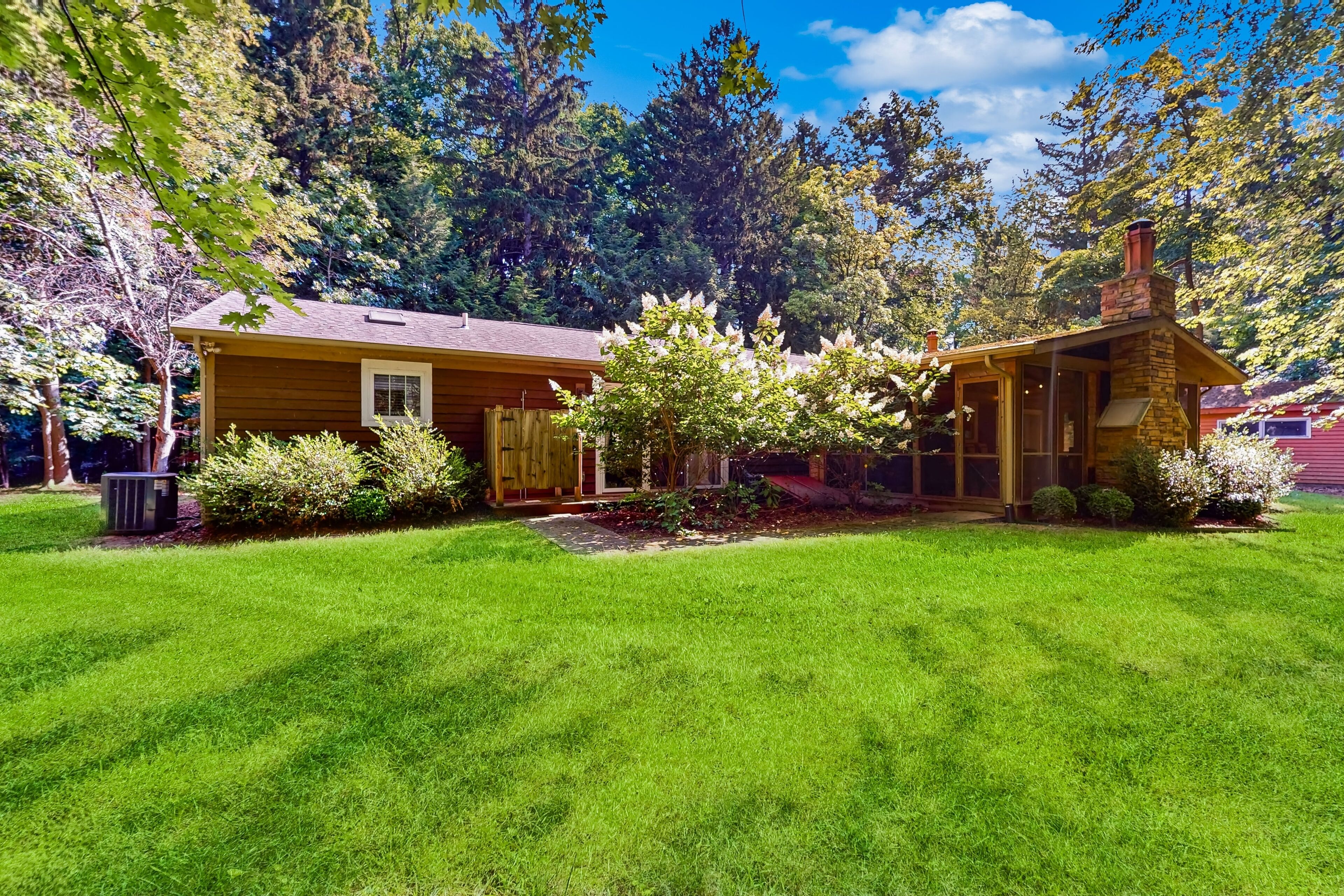 Woodland Home w/ Firepit, Screened Porch & WiFi - 250 Feet to Private Beach