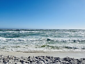 On the beach, sun loungers, beach towels