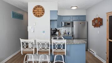 Coffee/tea maker, fridge, microwave, oven