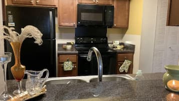 Microwave, dishwasher, cookware/dishes/utensils