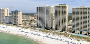 On the beach, sun-loungers, beach towels