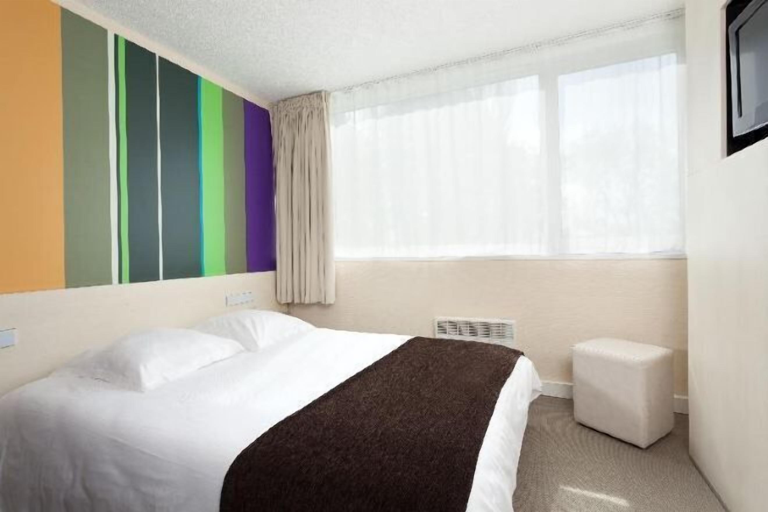 Premium bedding, in-room safe, individually decorated, desk