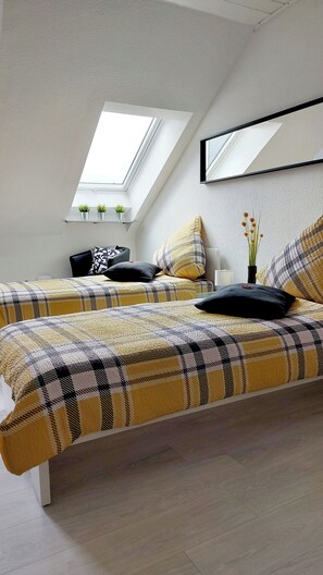 2 slaapkamers, een strijkplank/strijkijzer, gratis wifi, beddengoed