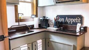 Fridge, microwave, stovetop, coffee/tea maker