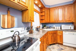 Fridge, microwave, oven, stovetop - Cool, Calm & Cozy | 2 BR Home with plenty of charm (Lansing)