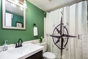 Combined shower/tub, hair dryer, towels, soap