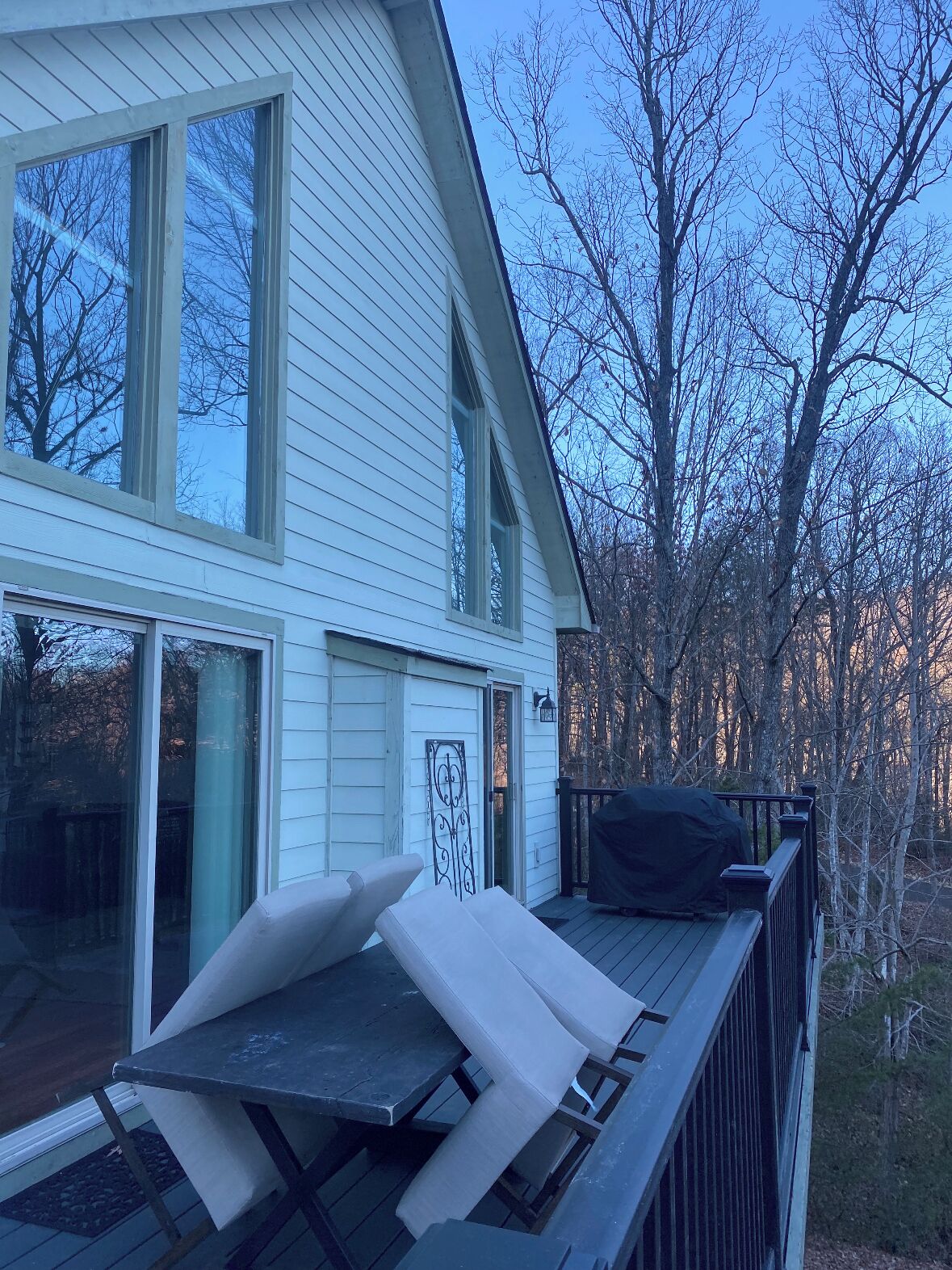 Wrap around porch with outside dining and propane grill